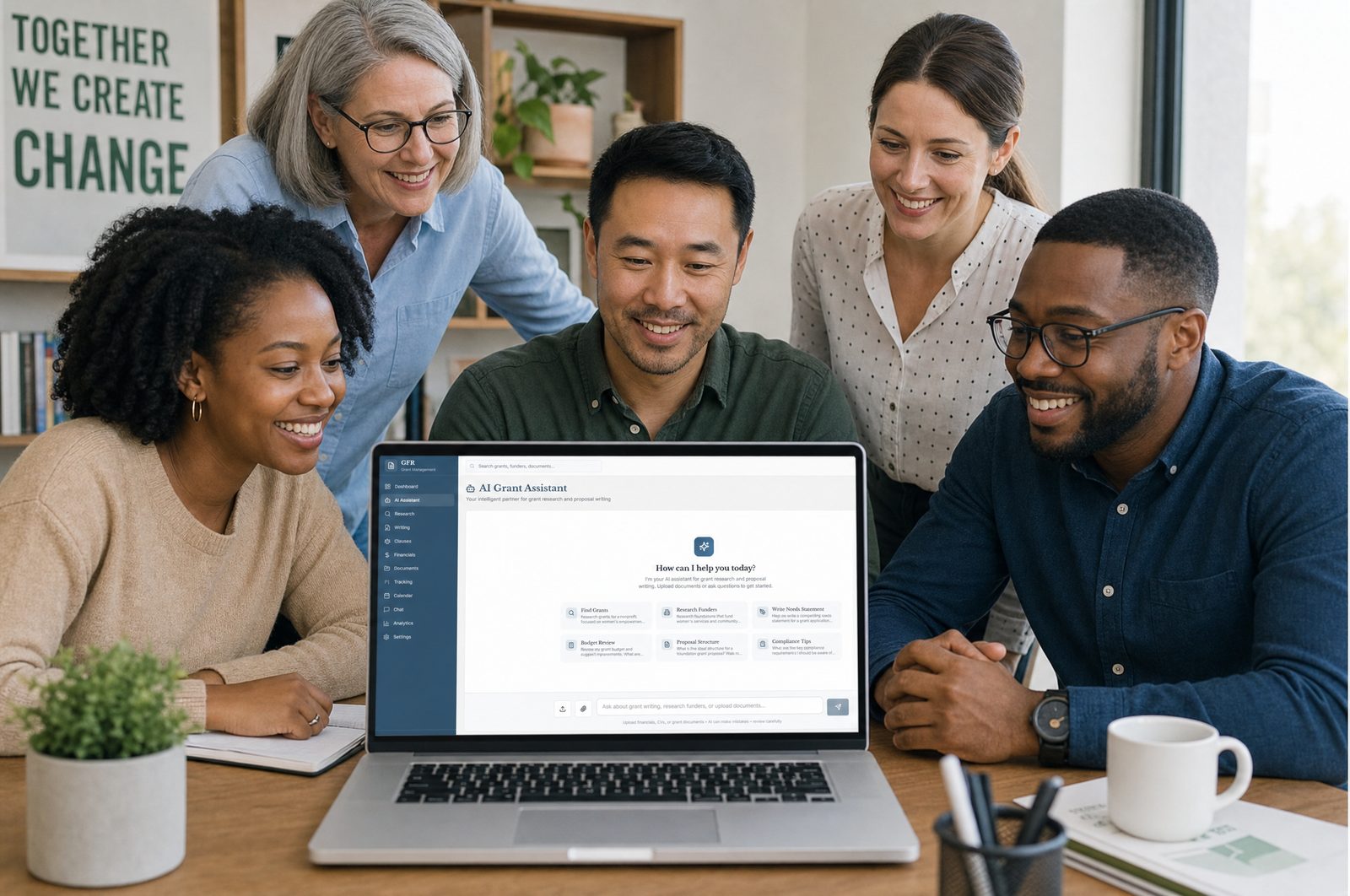 Nonprofit team reviewing the GFR AI Grant Assistant on a laptop